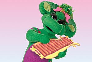 Baby Bop plays the xylophone