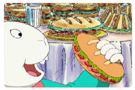 Buster eating sandwiches