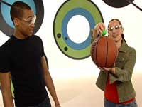 photo of hosts michael and mariko with a basketball