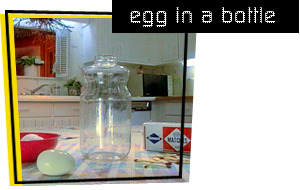 photo of an egg, bottle, and matches