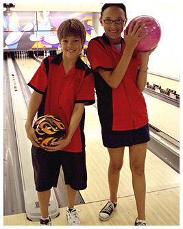 Willie and Bridget testing out their bowling invention at the bowling alley.