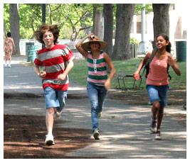 Jay, Sammy, and Harsha running down a path toward the camera.