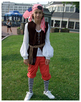 Marco wears a pirate costume.