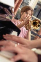 Playing trumpet
