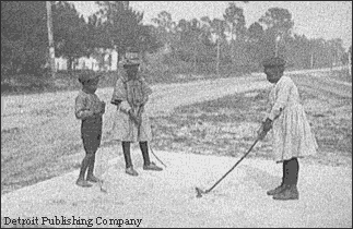 Boys Playing Golf