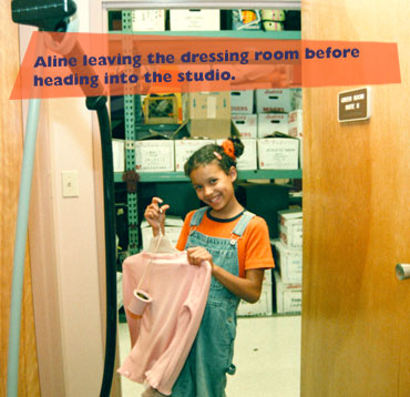 Aline leaving the dressing room before heading into the studio