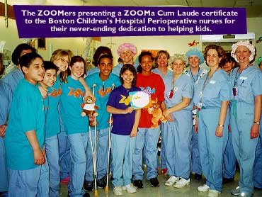 The ZOOMers presenting a ZOOMa Cum Laude certificate to the Boston Children's Hospital Perioperative nurses for their never-ending dedication to helping kids.